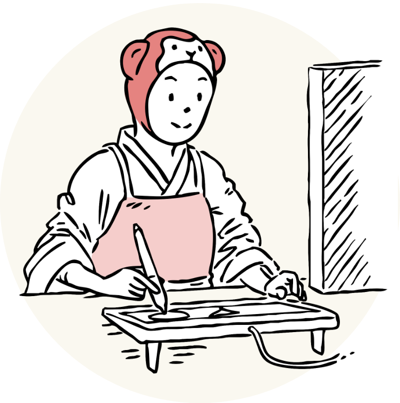 スタッフがタブレットでデザイン作業している様子